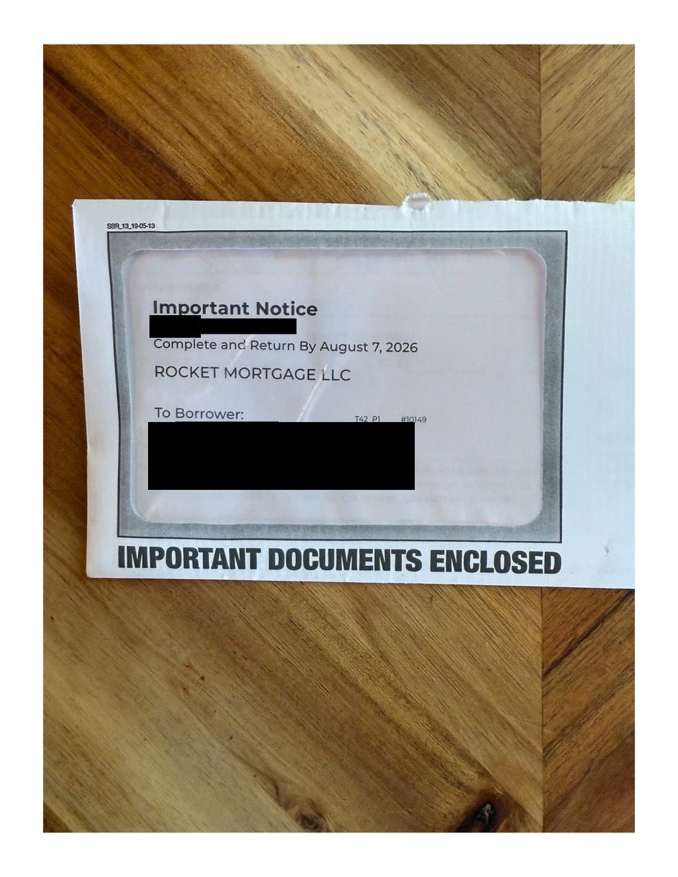 A window envelope reading Important Notice, Complete and Return By August 7, 2026, Rocket Mortgage LLC, with Important Documents Enclosed printed across the bottom.